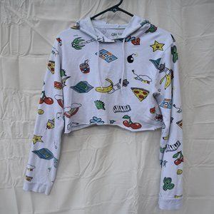 Long sleeve, hooded, "doodle" crop top.